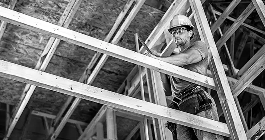 construction working in framed building